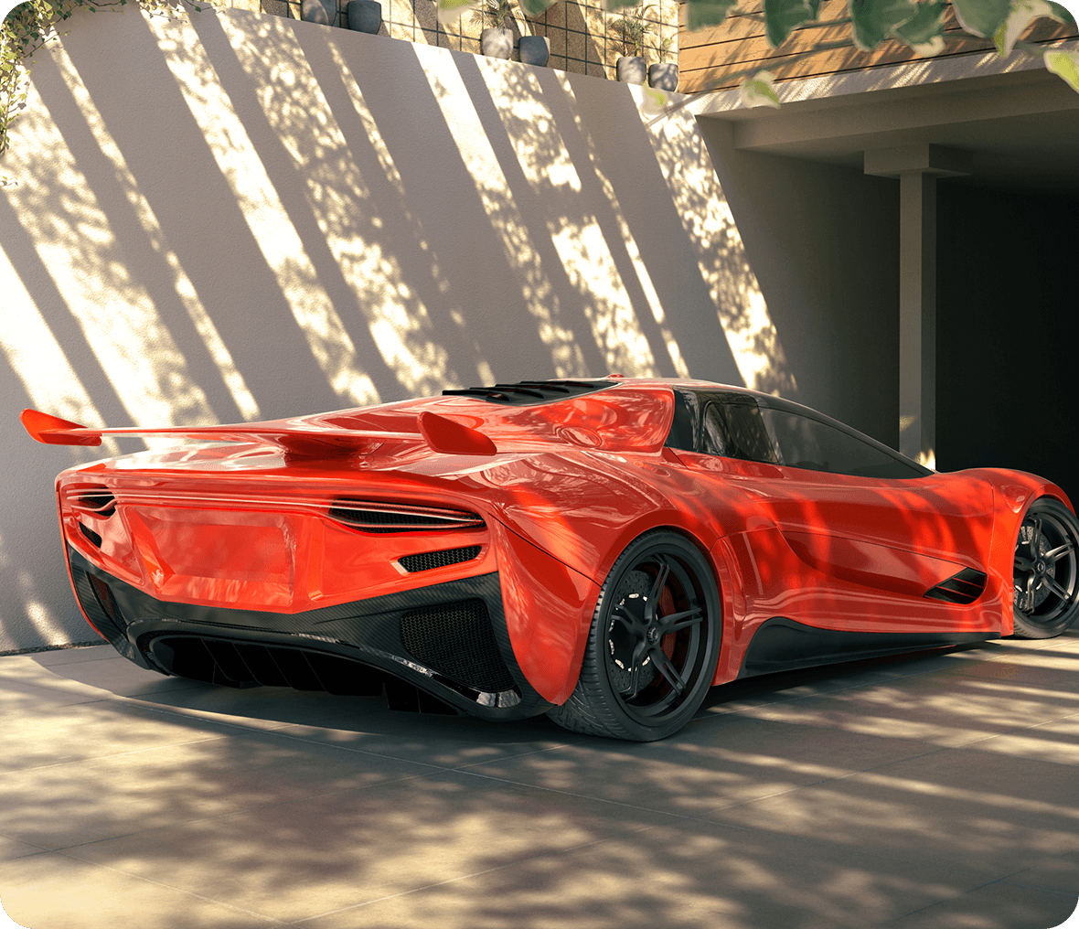 Red sports car parked in sunlight